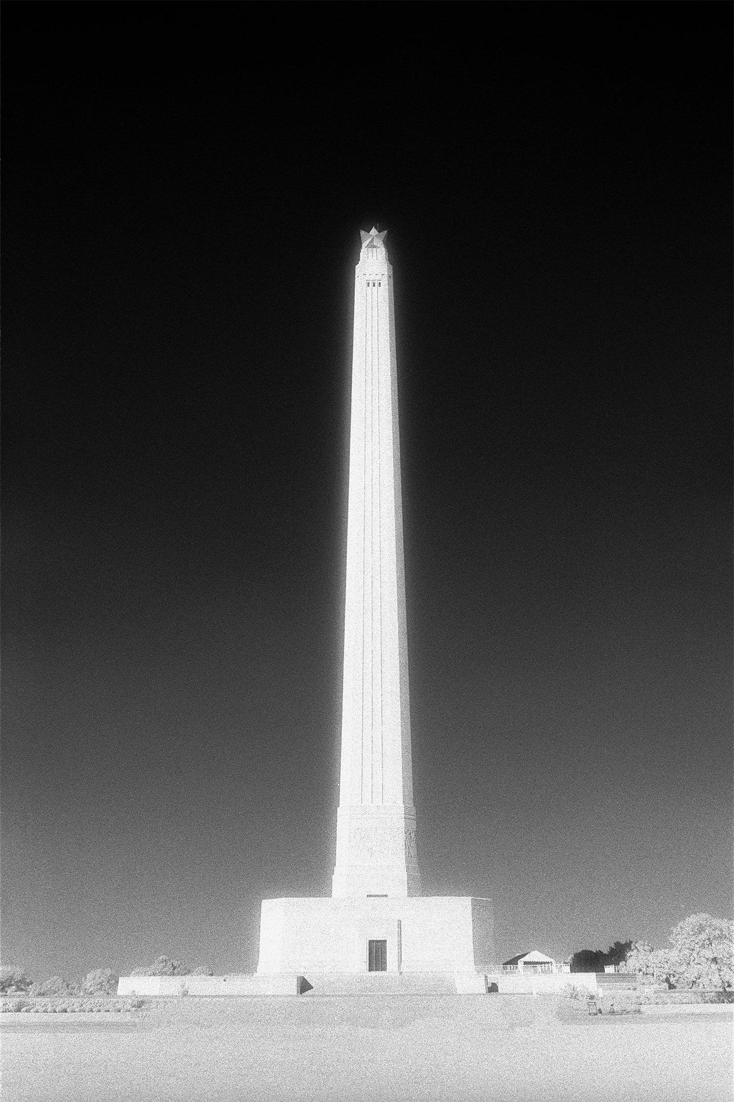 a black and white photo of a monument