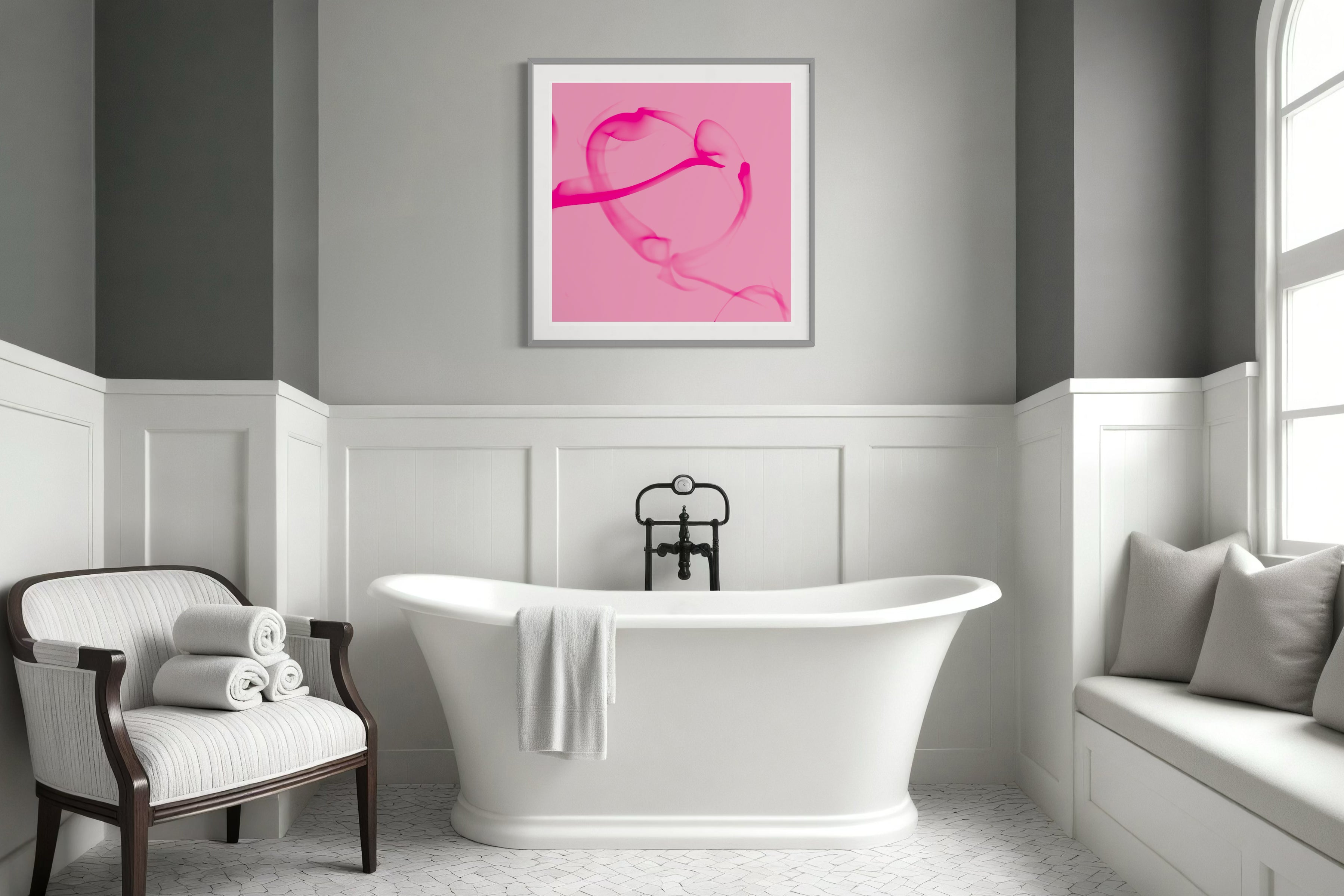 abstract pink heart on pink background in gray frame with white matte on wall in modern bathroom with gray tones