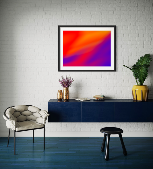 photo of abstract orange, yellow and purple in black frame on white brick wall in modern home