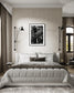 black and white, very tall monument lower middle, close up of trees all around, in black frame with white matte on light tan wall in upscale rustic bedroom