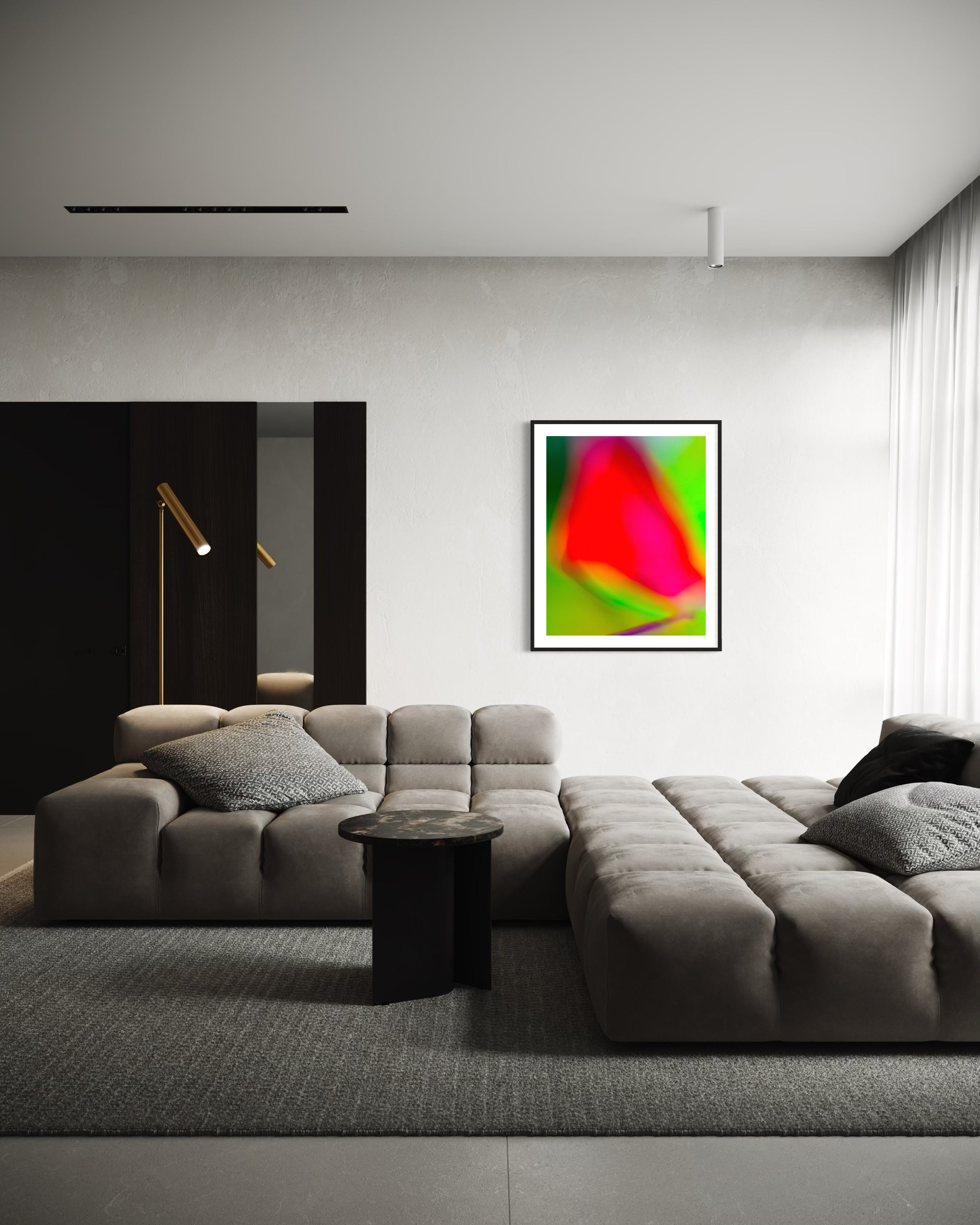 photo of blurry red leaf on blurred bright green background in black frame with white matte on white wall in modern minimalist living room with gray tones