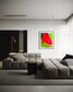 photo of blurry red leaf on blurred bright green background in black frame with white matte on white wall in modern minimalist living room with gray tones