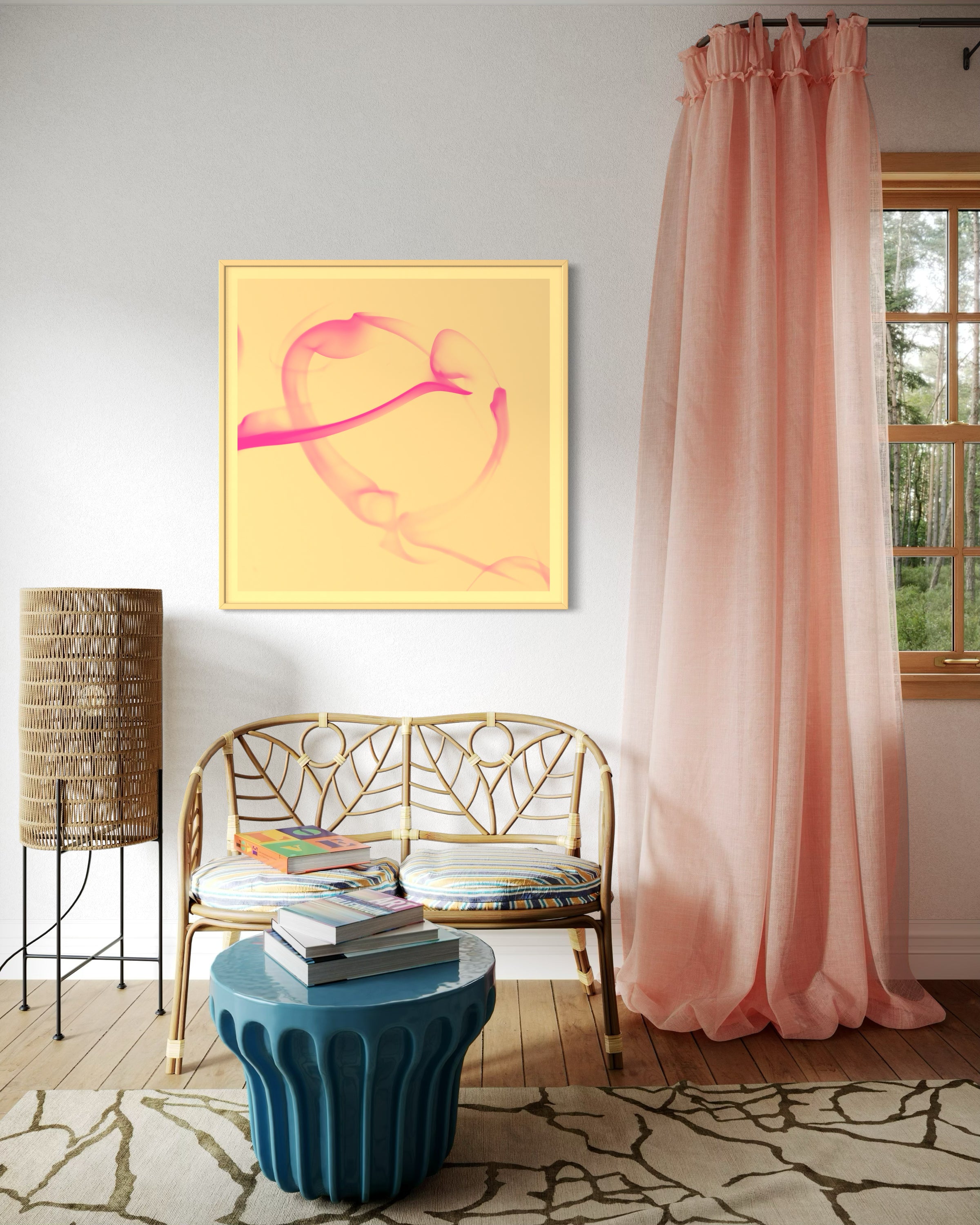 abstract pink heart on yellow background in yellow frame with yellow matte on off white wall  in rustic sitting area with wicker bench and pink curtain