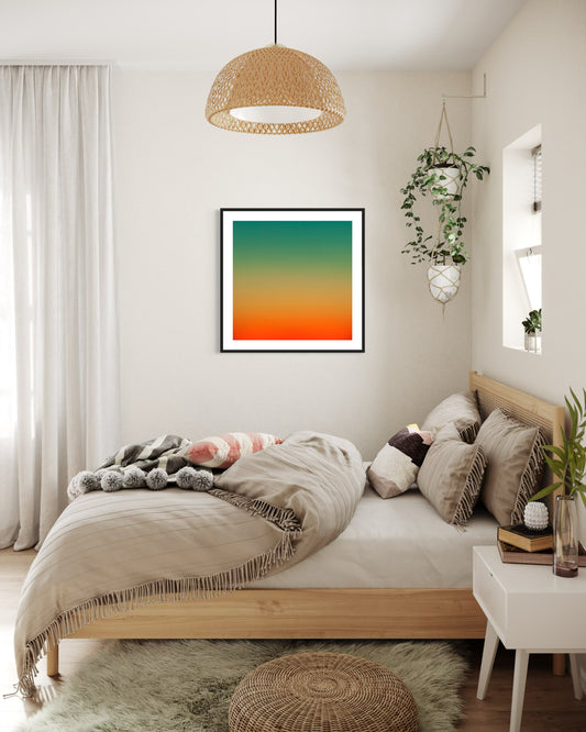 photo, gradient top to bottom teal blue, pale yellow and then orange in black frame with off white matte on white wall in Scandinavian style bedroom 