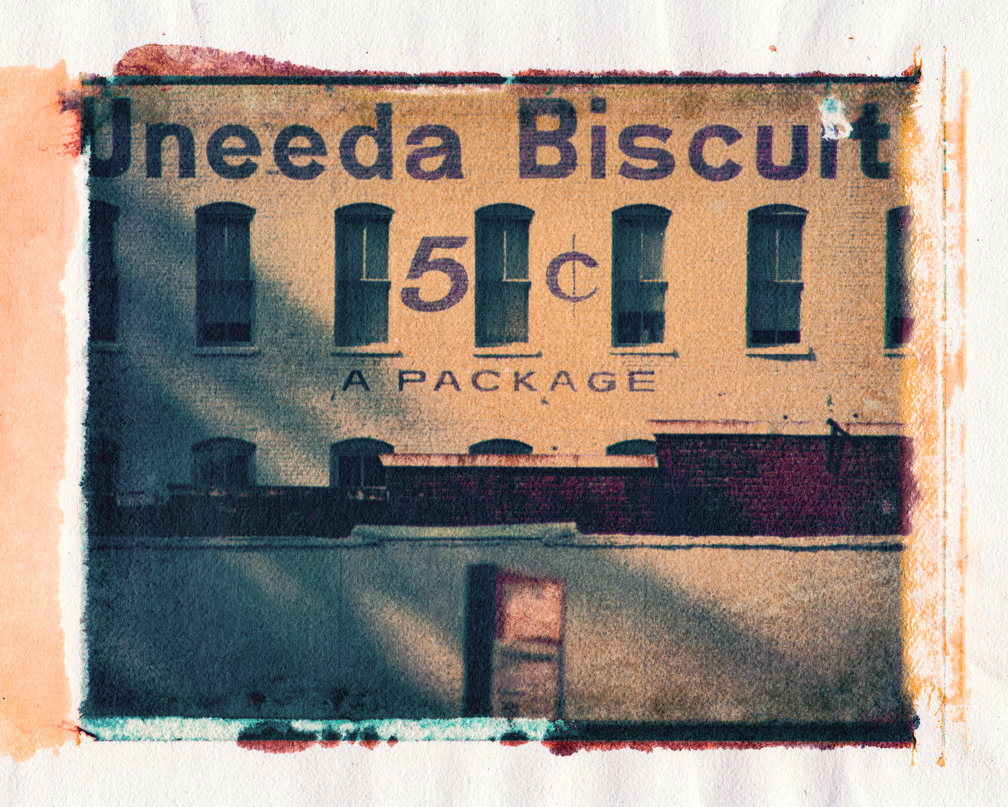 photo, Polaroid transfer, old building with "Uneeda Biscuit" big on the side