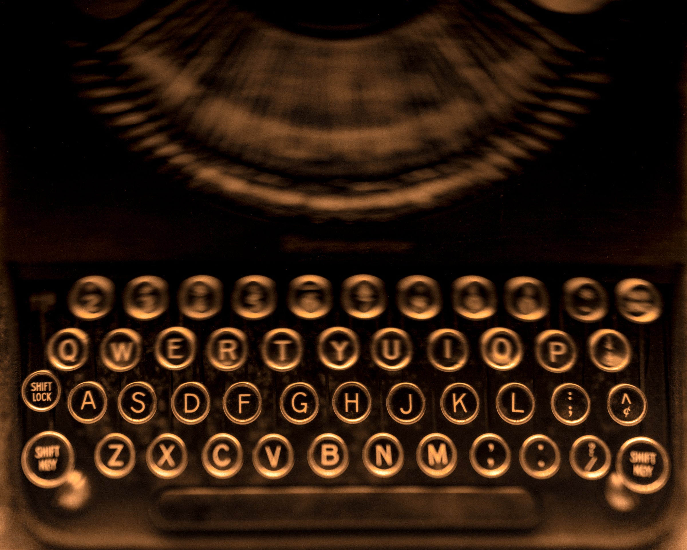 close up of old typewriter from above, horizontal black and white photo