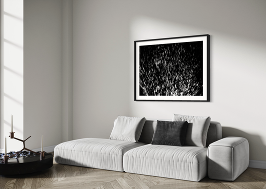 abstract water spray, backlit, spraying up, macro, black and white, photo art print in black frame on wall in minimalist modern living room