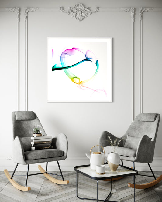 abstract heart in pink, green, gold, teal, red on white background in white frame on light gray wall