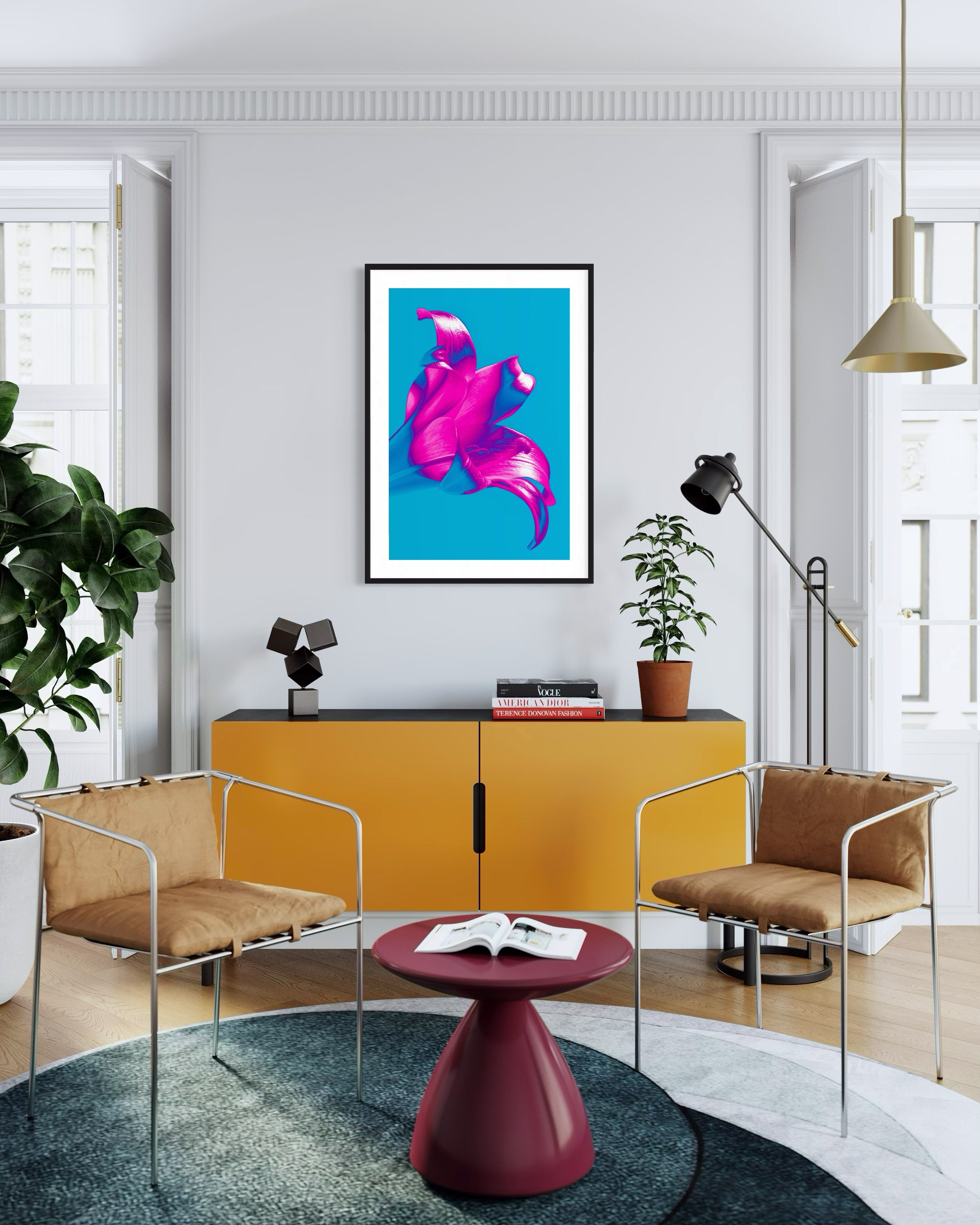 Modern living room with yellow cabinet, brown chairs, and a colorful abstract painting.